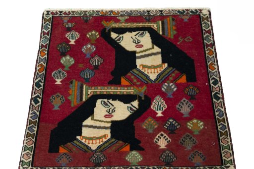 Surface texture of 2000s Shiraz rug with natural Wool and intricate pattern