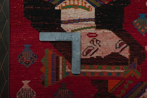 Backside of handmade 2000s Shiraz rug showing knot structure and weave density