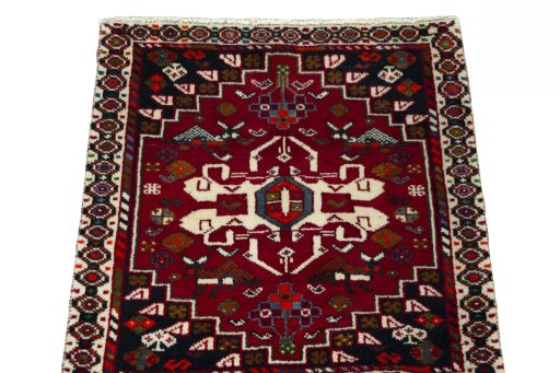 Surface texture of 2000s Shiraz rug with natural Wool and intricate pattern