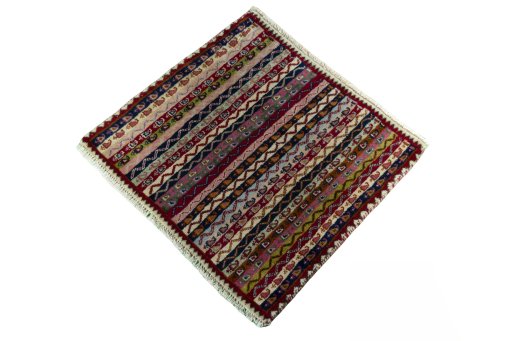 Corner detail of 2000s Shiraz rug showing border pattern and Wool pile