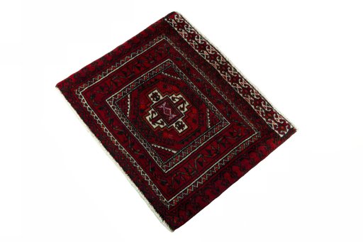 Corner detail of 2000s Shiraz rug showing border pattern and Wool pile