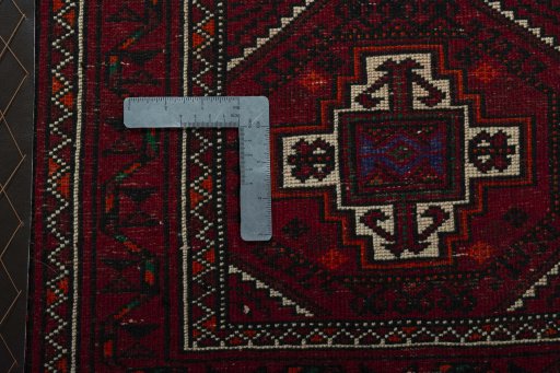 Backside of handmade 2000s Shiraz rug showing knot structure and weave density