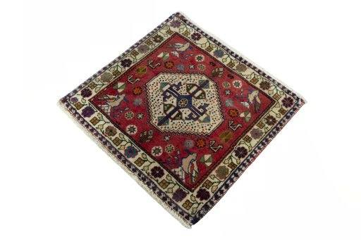 Corner detail of 2000s Shiraz rug showing border pattern and Wool pile