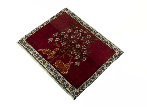 Corner detail of 2000s Shiraz rug showing border pattern and Wool pile