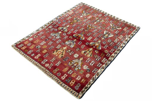 Corner detail of 2000s Shiraz rug showing border pattern and Wool pile