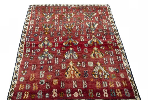 Surface texture of 2000s Shiraz rug with natural Wool and intricate pattern