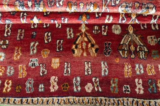 Full view of 2000s Shiraz rug from Iran / Persia, 153 × 118 cm in Red tones