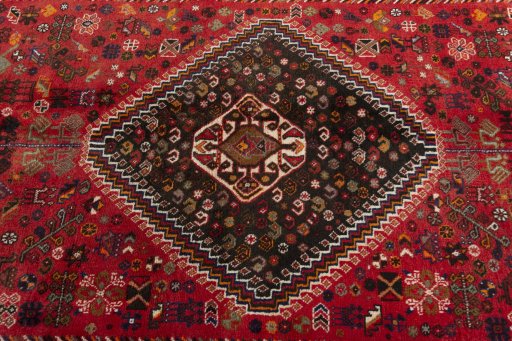 Central medallion detail of 2000s Shiraz rug from Iran / Persia