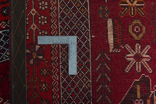 Surface texture of 2000s Shiraz rug with natural Wool and intricate pattern