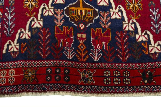 Close-up detail of 2000s Shiraz rug from Iran / Persia showing Wool weave