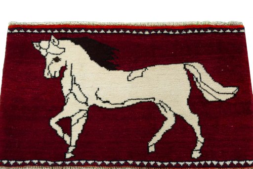 Surface texture of 2000s Shiraz rug with natural Wool and intricate pattern