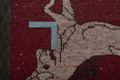 Backside of handmade 2000s Shiraz rug showing knot structure and weave density