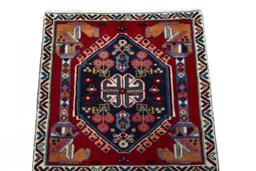 Surface texture of 2000s Shiraz rug with natural Wool and intricate pattern