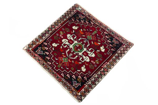 Corner detail of 2000s Shiraz rug showing border pattern and Wool pile