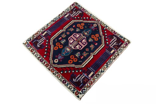 Corner detail of 2000s Shiraz rug showing border pattern and Wool pile
