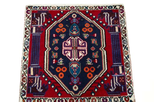 Surface texture of 2000s Shiraz rug with natural Wool and intricate pattern