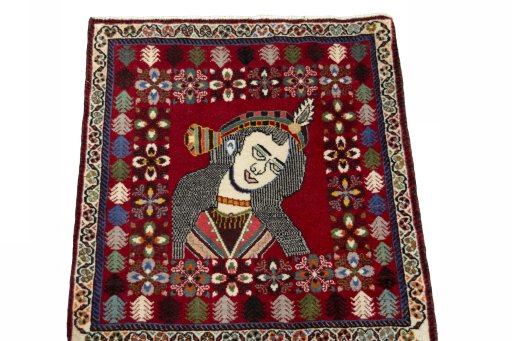 Surface texture of 2000s Shiraz rug with natural Wool and intricate pattern