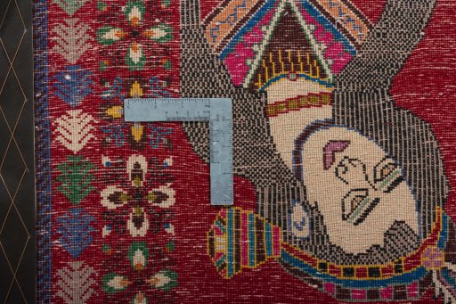 Backside of handmade 2000s Shiraz rug showing knot structure and weave density