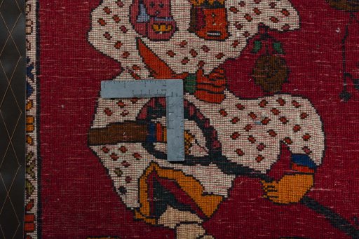 Backside of handmade 2000s Shiraz rug showing knot structure and weave density