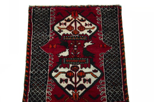 Surface texture of 2000s Shiraz rug with natural Wool and intricate pattern