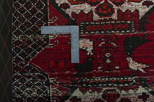 Backside of handmade 2000s Shiraz rug showing knot structure and weave density