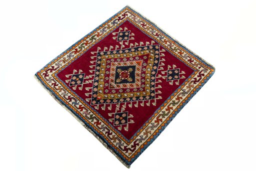 Corner detail of 2000s Shiraz rug showing border pattern and Wool pile