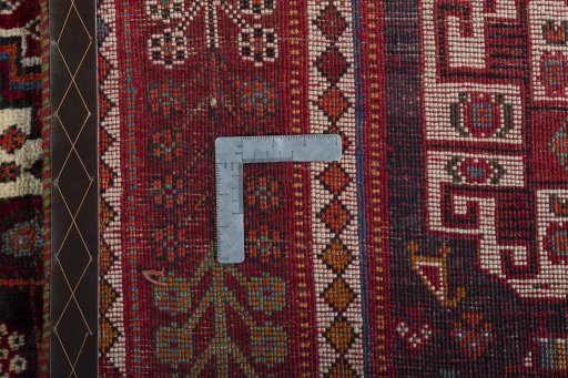 Surface texture of 2000s Shiraz rug with natural Wool and intricate pattern