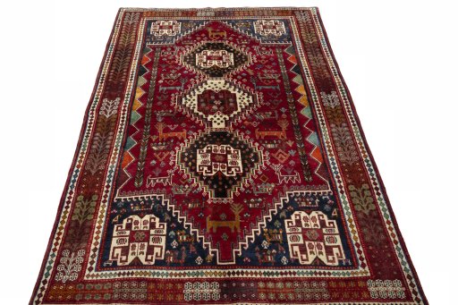 Surface texture of 2000s Shiraz rug with natural Wool and intricate pattern