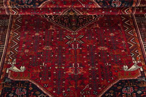 Corner detail of 2000s Shiraz rug showing border pattern and Wool pile