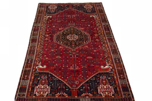 Surface texture of 2000s Shiraz rug with natural Wool and intricate pattern
