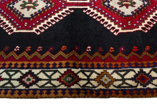 Close-up detail of 2000s Shiraz rug from Iran / Persia showing Wool weave
