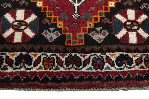 Central medallion detail of 2000s Shiraz rug from Iran / Persia