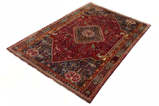 Corner detail of 2000s Shiraz rug showing border pattern and Wool pile