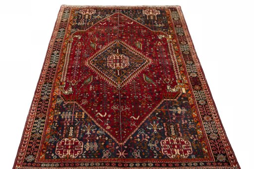 Surface texture of 2000s Shiraz rug with natural Wool and intricate pattern
