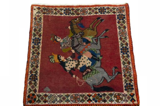 Surface texture of 2000s Shiraz rug with natural Wool and intricate pattern