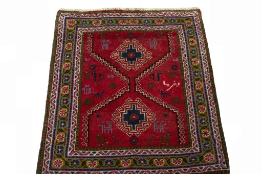 Surface texture of 2000s Shiraz rug with natural Wool and intricate pattern