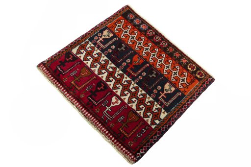Corner detail of 2000s Shiraz rug showing border pattern and Wool pile