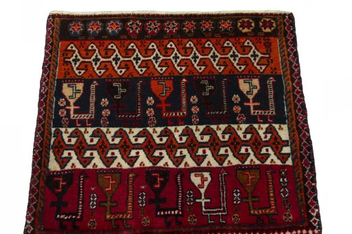 Surface texture of 2000s Shiraz rug with natural Wool and intricate pattern