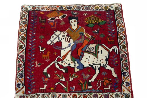 Surface texture of 2000s Shiraz rug with natural Wool and intricate pattern