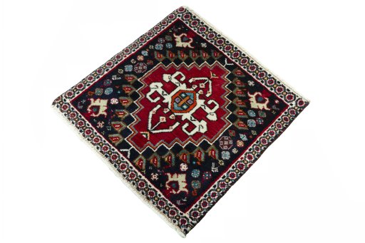 Corner detail of 2000s Shiraz rug showing border pattern and Wool pile