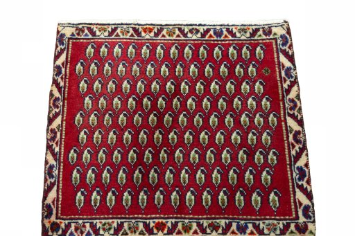 Surface texture of 2000s Shiraz rug with natural Wool and intricate pattern