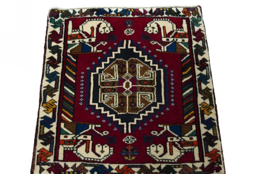 Surface texture of 2000s Shiraz rug with natural Wool and intricate pattern