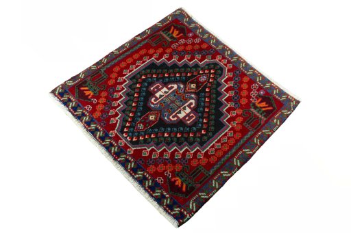 Corner detail of 2000s Shiraz rug showing border pattern and Wool pile