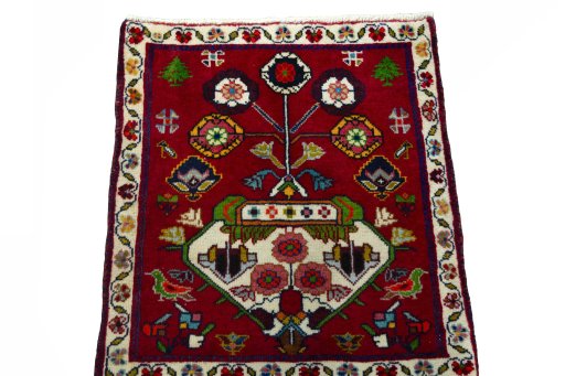 Surface texture of 2000s Shiraz rug with natural Wool and intricate pattern