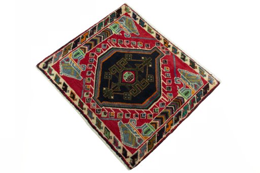 Corner detail of 2000s Shiraz rug showing border pattern and Wool pile