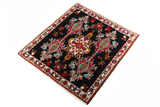 Corner detail of 2000s Shiraz rug showing border pattern and Wool pile