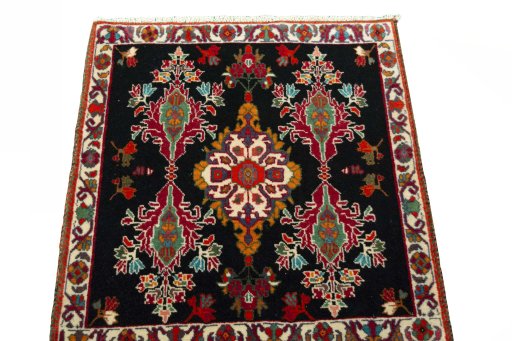 Surface texture of 2000s Shiraz rug with natural Wool and intricate pattern