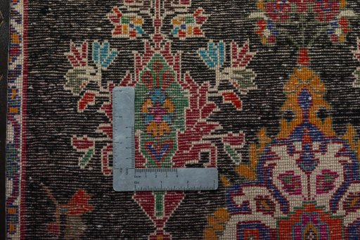 Backside of handmade 2000s Shiraz rug showing knot structure and weave density