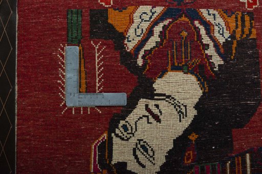 Backside of handmade 2000s Shiraz rug showing knot structure and weave density