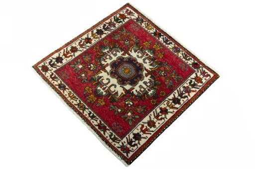 Corner detail of 2000s Shiraz rug showing border pattern and Wool pile